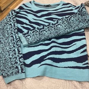 Two tone sweater made from viscose and nylon